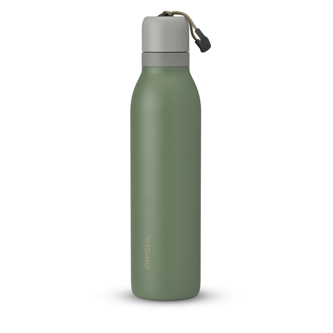 FreeSip Twist 24oz in Green House, deep olive green insulated water bottle with light gray twist cap, matching gray twist cap accent band, and olive carry string with dark gray grip